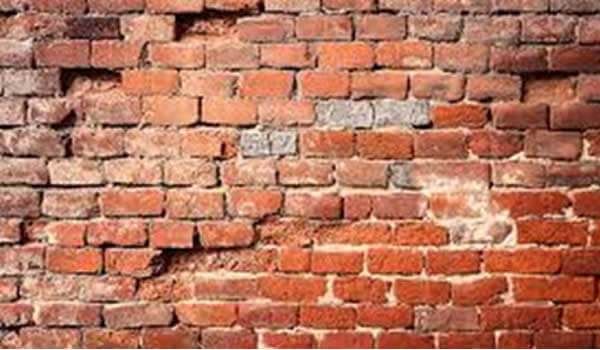 Solid masonry wall construction